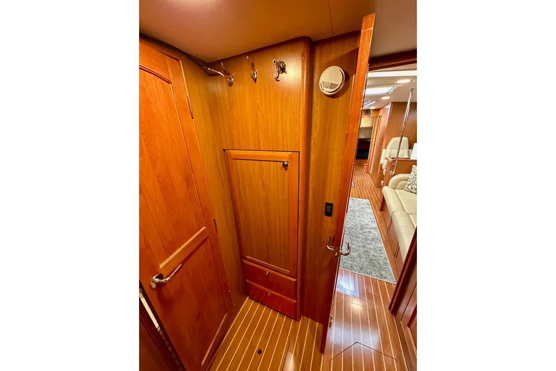 Dasananas Yacht Photos Pics Interior of 2008 Hunter 49 yacht with wooden paneling and modern design.