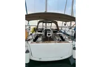 2020 Dufour 360 Grand Large sailboat with dual steering wheels at dock.