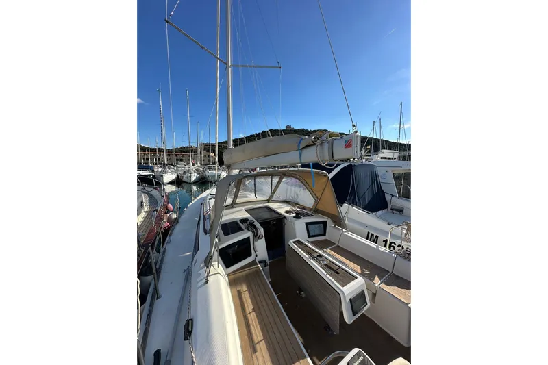  Yacht Photos Pics 2020 Dufour 360 Grand Large sailboat docked in a marina under clear blue skies.