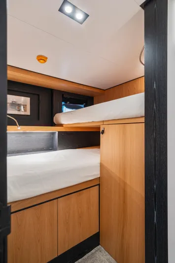 Ice Yacht Photos Pics 2024 Soyaslan 78' yacht interior with modern wooden bunk beds.