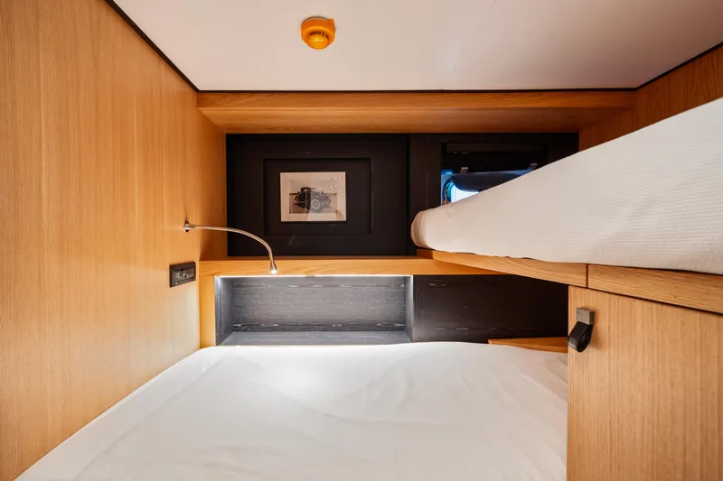 Ice Yacht Photos Pics Luxurious cabin interior of 2024 Soyaslan 78' yacht with modern wood finish.