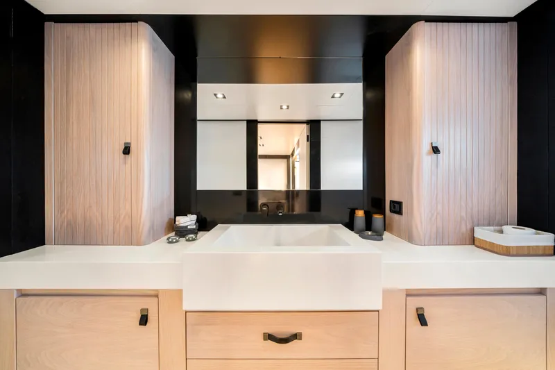 Ice Yacht Photos Pics Modern bathroom vanity in 2024 Soyaslan 78' yacht, featuring sleek design and ample storage.
