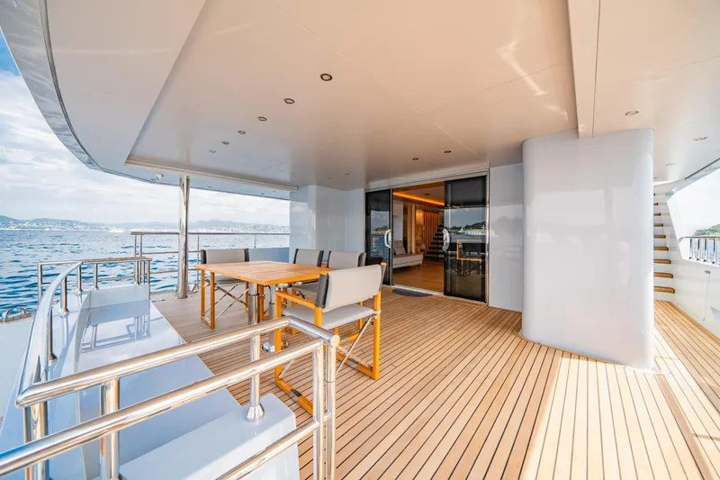 Ice Yacht Photos Pics Luxurious 2024 Soyaslan 78' yacht deck with elegant seating and ocean view.