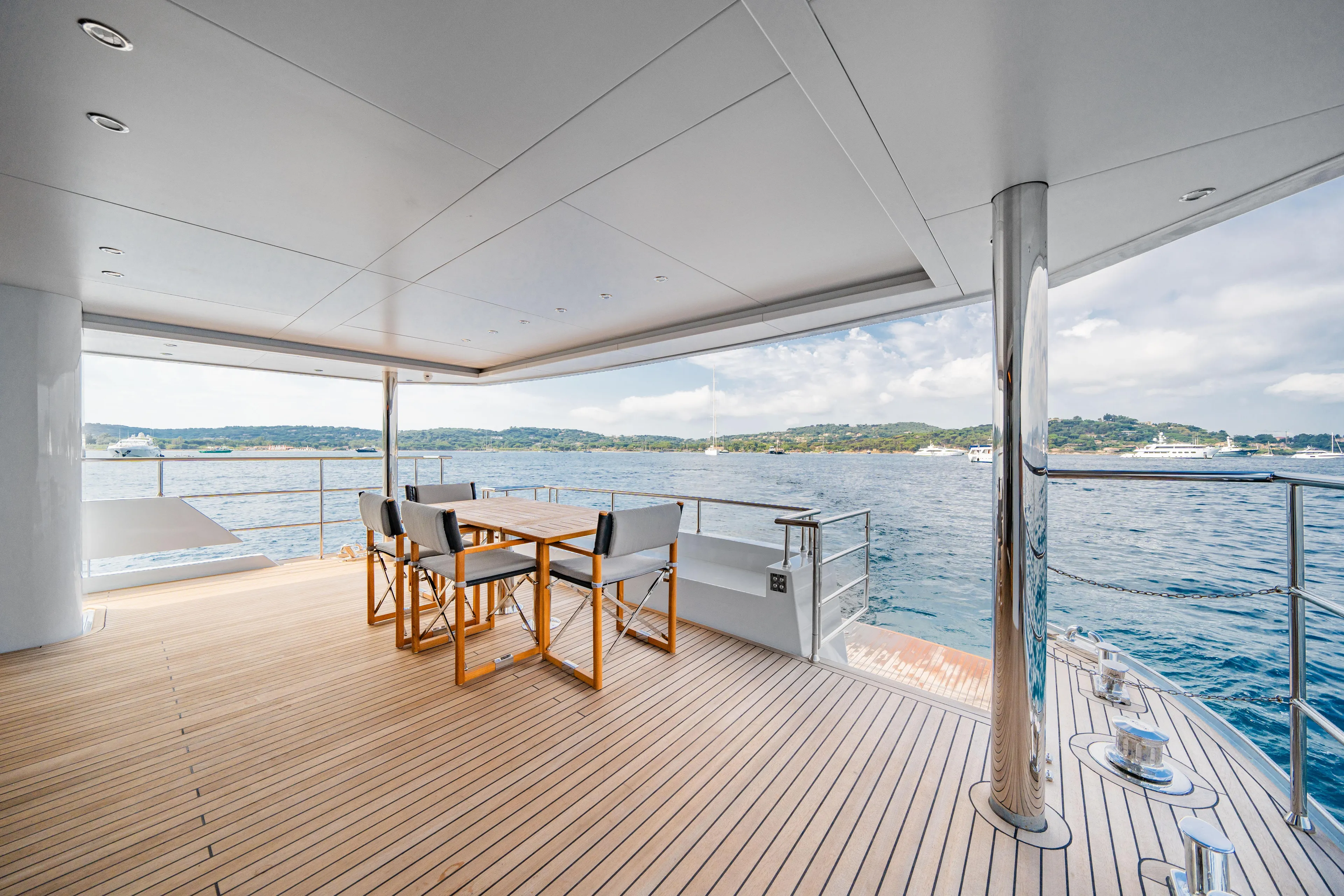 Ice Yacht Photos Pics Luxurious 2024 Soyaslan 78' yacht deck with ocean view and elegant seating area.