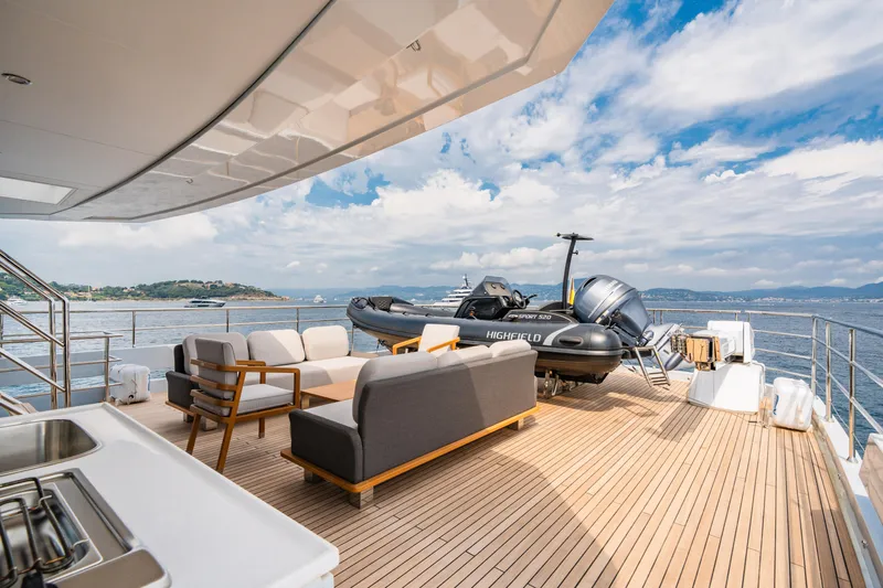 Ice Yacht Photos Pics Luxurious 2024 Soyaslan 78' yacht deck with seating and ocean view.