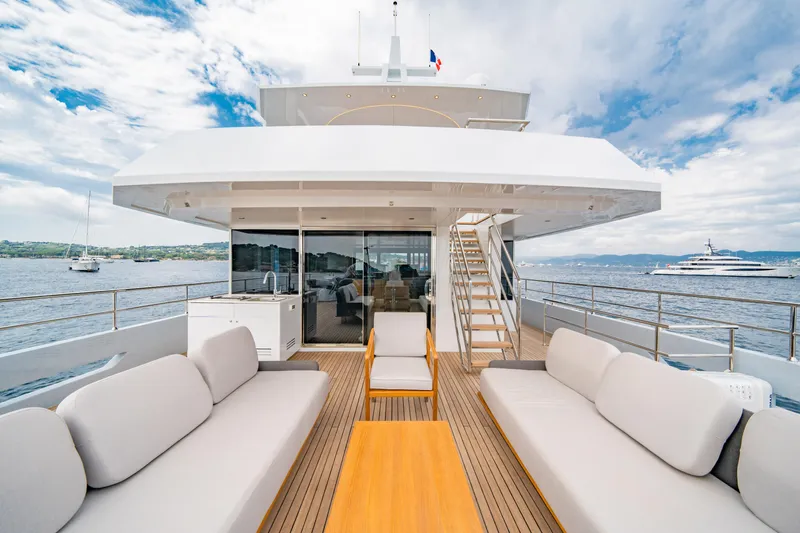 Ice Yacht Photos Pics Luxurious 2024 Soyaslan 78' yacht deck with modern seating and ocean view.