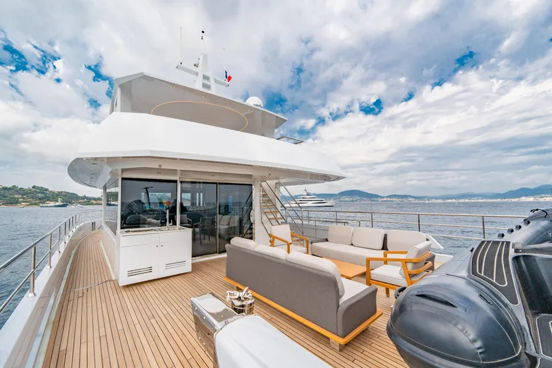 Ice Yacht Photos Pics Luxurious 2024 Soyaslan 78' yacht deck with modern seating and ocean view.