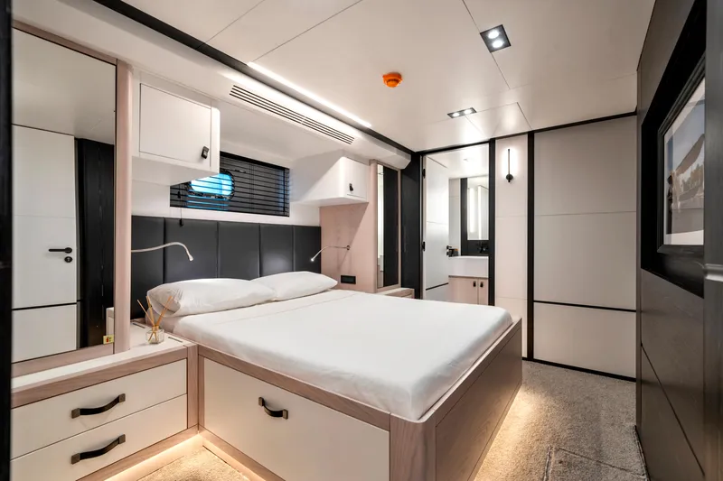 Ice Yacht Photos Pics Luxurious Soyaslan 78' 2024 yacht bedroom with modern design and ambient lighting.