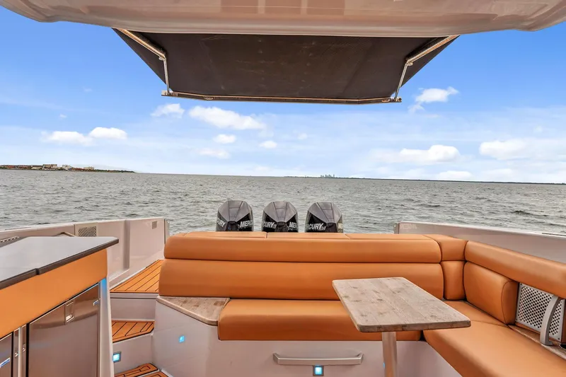  Yacht Photos Pics 2021 Aviara AV36 OB boat with luxurious seating and scenic ocean view.