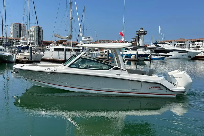 2023 Boston Whaler 280 Vantage @ Puerto Vallarta Yacht Photos Pics 2023 Boston Whaler 280 Vantage boat docked in a marina with other vessels.