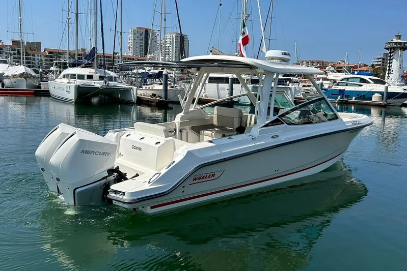 2023 Boston Whaler 280 Vantage @ Puerto Vallarta Yacht Photos Pics 2023 Boston Whaler 280 Vantage boat docked in a marina with Mercury engines.