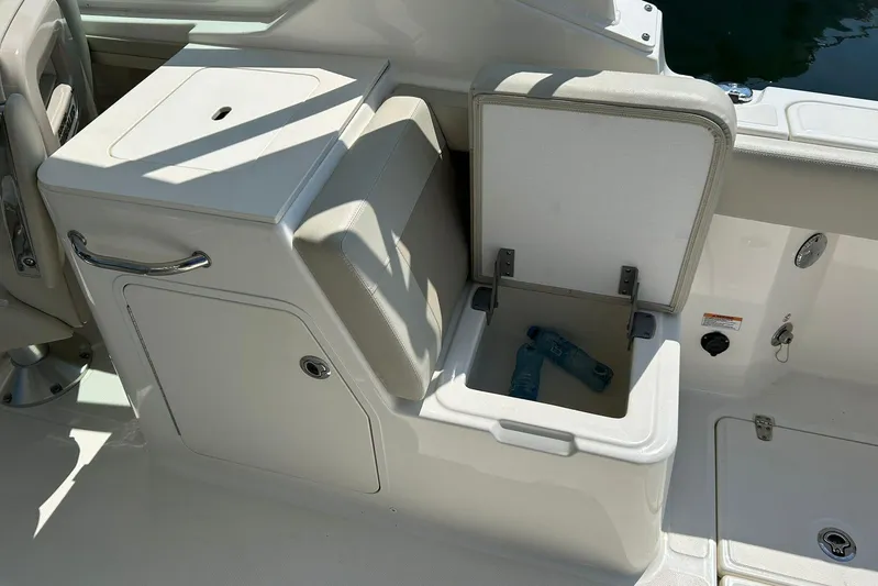 2023 Boston Whaler 280 Vantage @ Puerto Vallarta Yacht Photos Pics 2023 Boston Whaler 280 Vantage boat interior with open storage compartment.