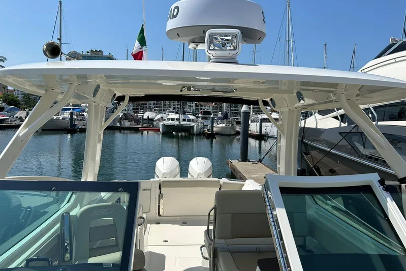 2023 Boston Whaler 280 Vantage @ Puerto Vallarta Yacht Photos Pics 2023 Boston Whaler 280 Vantage boat docked in a marina, showcasing its sleek design.