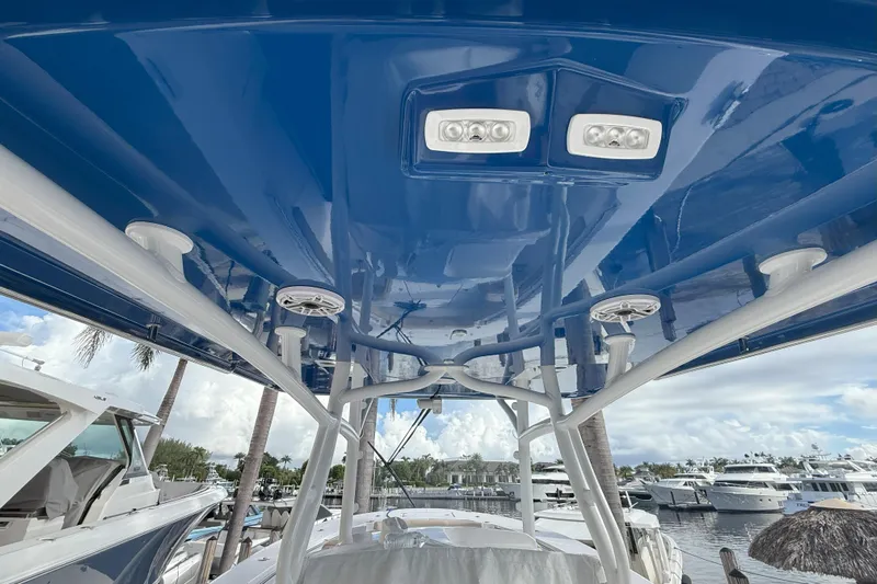 Chasing Palooza Yacht Photos Pics 2024 Southport 30 FE boat's blue canopy with integrated lights and speakers.