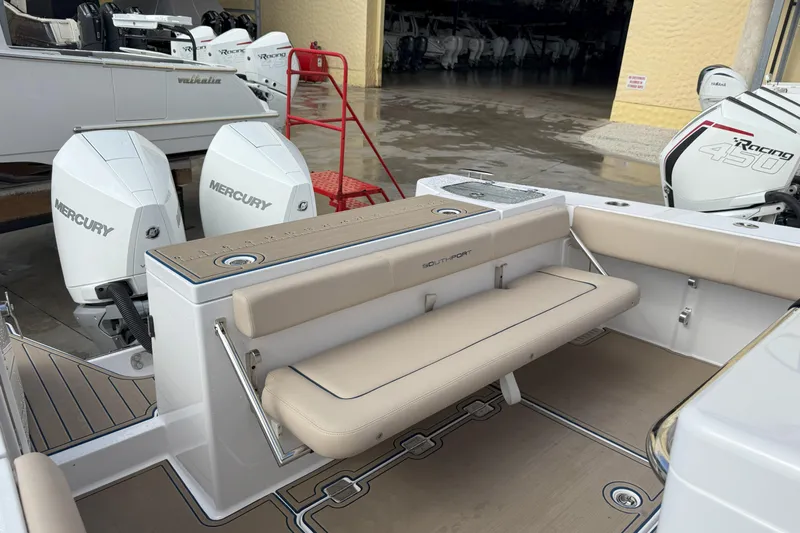 Chasing Palooza Yacht Photos Pics 2024 Southport 30 FE boat with Mercury engines and beige seating.