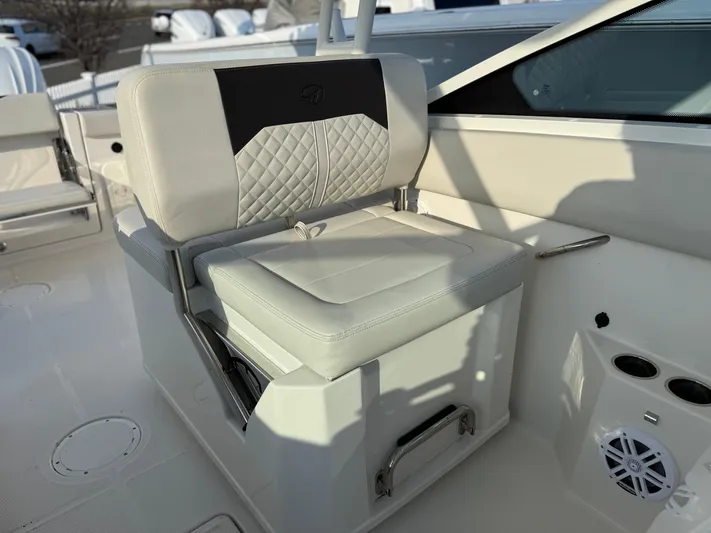  Yacht Photos Pics 2024 Sailfish 276 DC boat seat with quilted design and integrated storage.