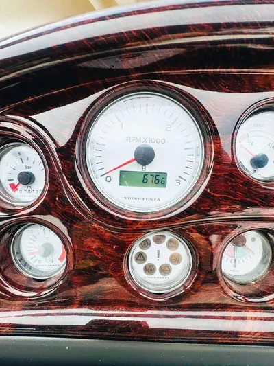  Yacht Photos Pics Dashboard of 2006 Cranchi Mediterranee 47 with RPM and gauge displays.