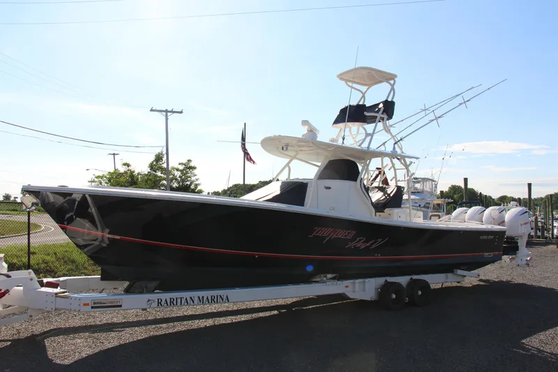  Yacht Photos Pics 2016 Regulator 41 boat on trailer at Raritan Marina, sunny day.