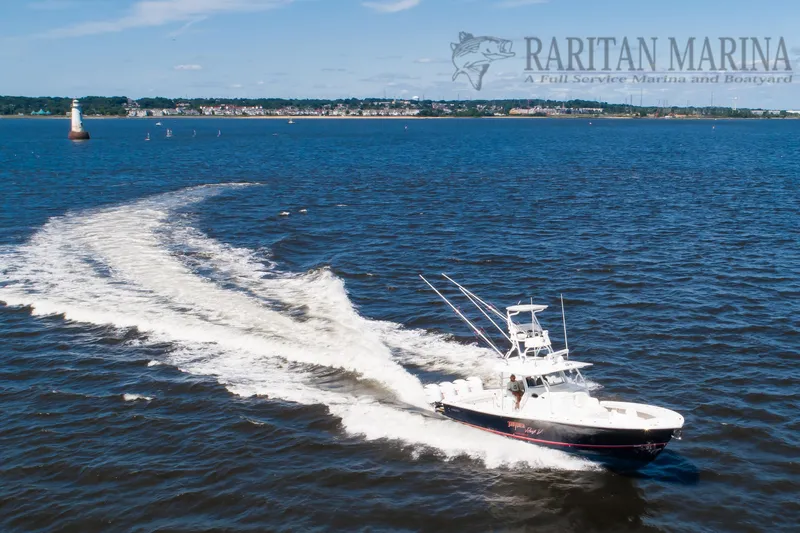  Yacht Photos Pics 2016 Regulator 41 boat cruising on open water near Raritan Marina.