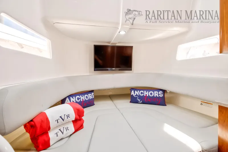  Yacht Photos Pics Luxurious interior of 2016 Regulator 41 boat with cozy seating and TV.