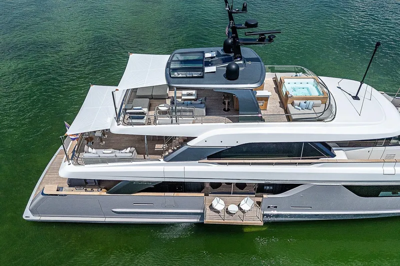 The Wolf Yacht Photos Pics Luxurious 2023 Sanlorenzo SD118 yacht with spacious decks and modern amenities on the water.