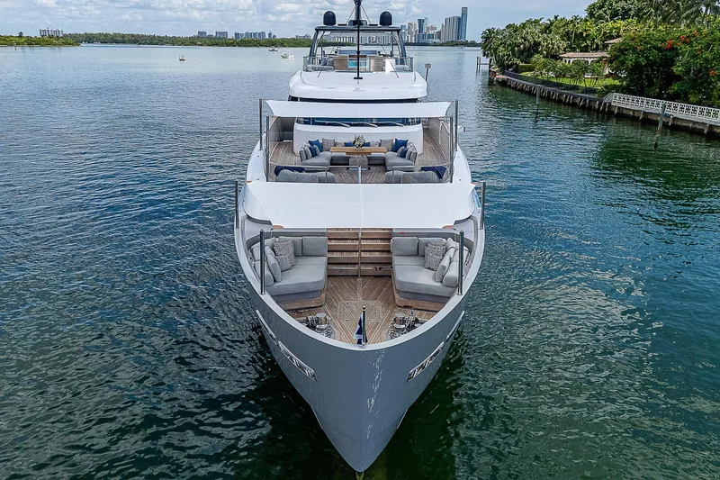 The Wolf Yacht Photos Pics Luxurious 2023 Sanlorenzo SD118 yacht cruising in a scenic waterway.