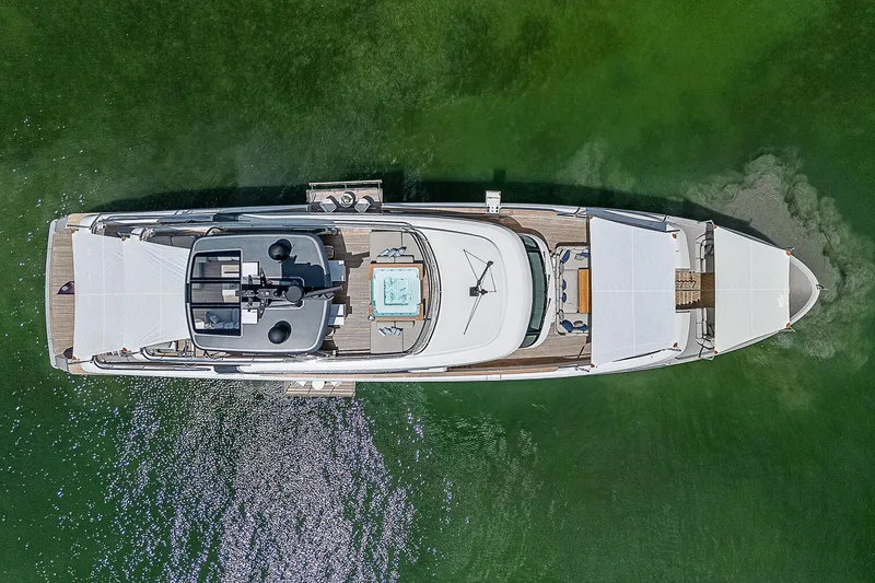 The Wolf Yacht Photos Pics Aerial view of 2023 Sanlorenzo SD118 yacht on green water.
