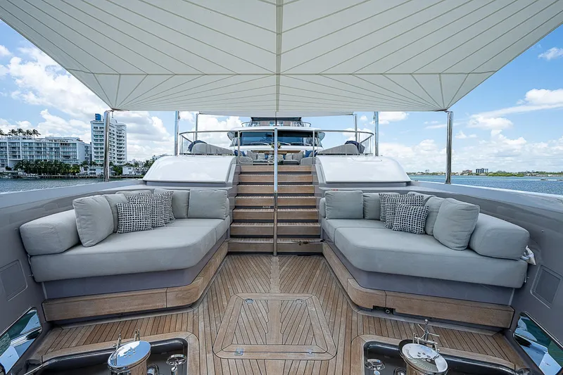 The Wolf Yacht Photos Pics Luxurious 2023 Sanlorenzo SD118 yacht deck with plush seating and ocean view.