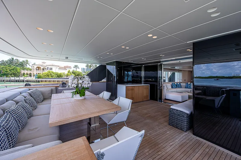 The Wolf Yacht Photos Pics Luxurious 2023 Sanlorenzo SD118 yacht interior with elegant seating and dining area.