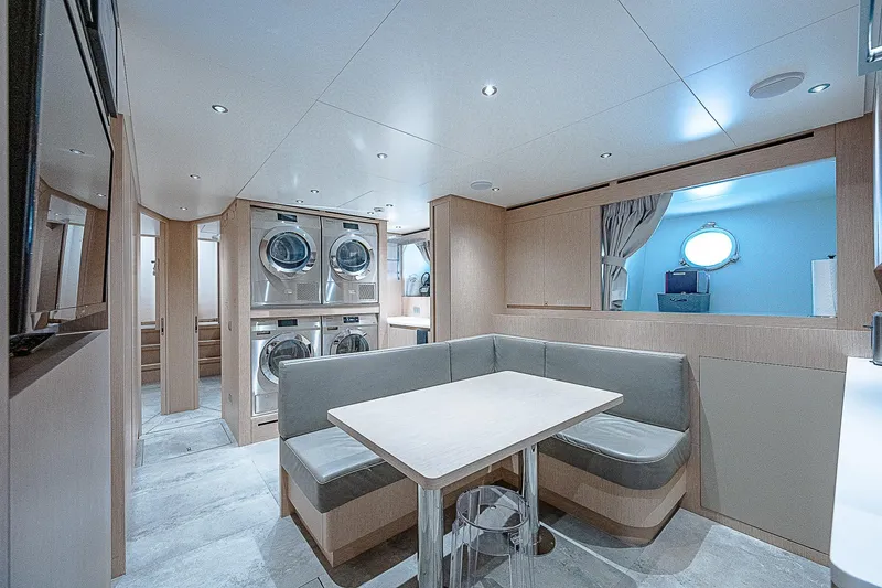 The Wolf Yacht Photos Pics Laundry room and seating area on 2023 Sanlorenzo SD118 yacht.