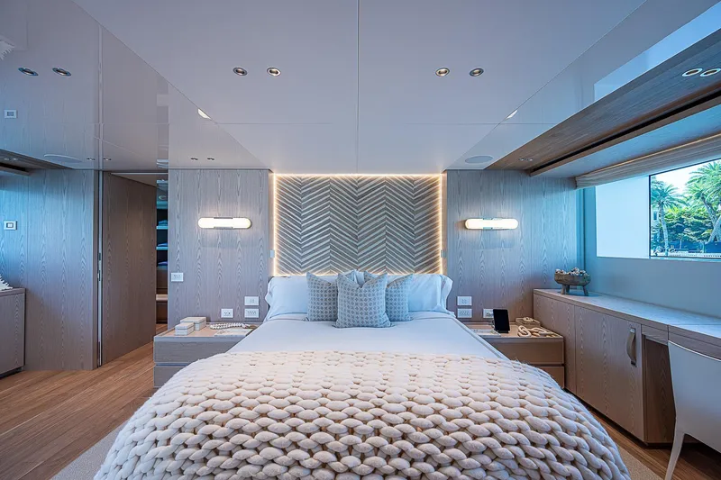 The Wolf Yacht Photos Pics Luxurious bedroom interior of 2023 Sanlorenzo SD118 yacht with modern design and cozy decor.