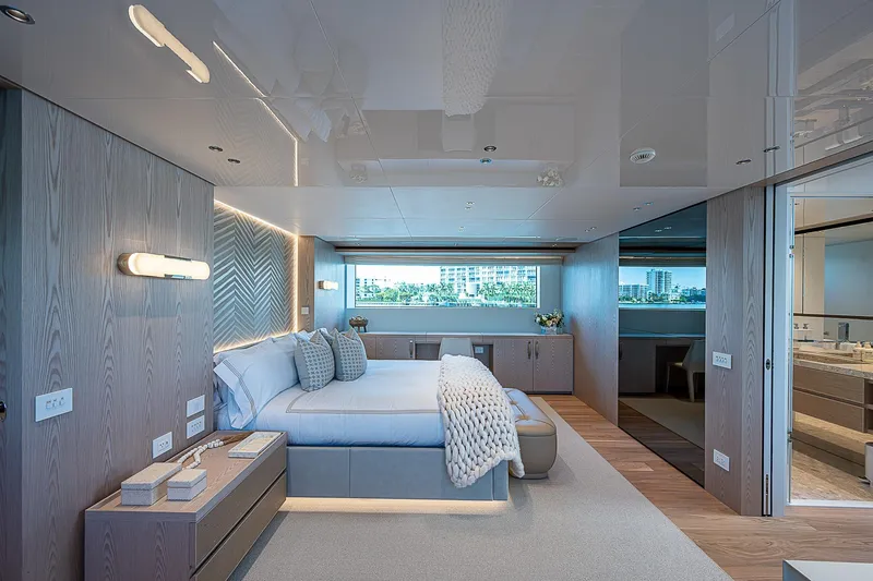 The Wolf Yacht Photos Pics Luxurious bedroom on 2023 Sanlorenzo SD118 yacht, featuring modern design and large window views.