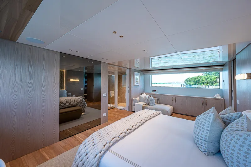 The Wolf Yacht Photos Pics Luxurious bedroom interior of 2023 Sanlorenzo SD118 yacht with modern design and scenic window view.