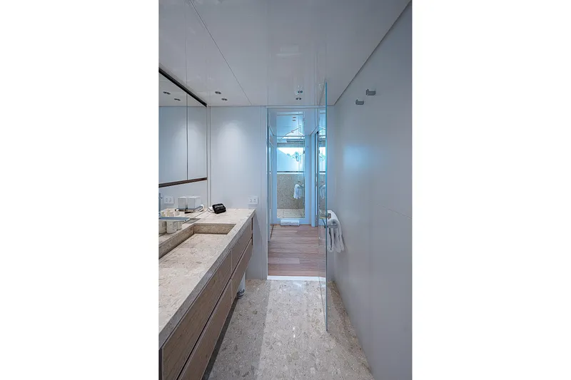 The Wolf Yacht Photos Pics Luxurious bathroom interior on 2023 Sanlorenzo SD118 yacht, featuring elegant marble and wood finishes.