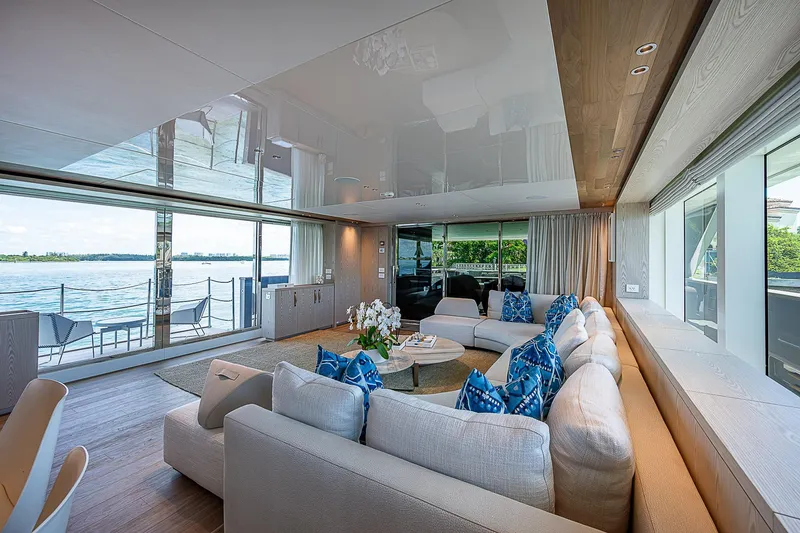 The Wolf Yacht Photos Pics Luxurious interior of 2023 Sanlorenzo SD118 yacht with elegant seating and panoramic ocean views.