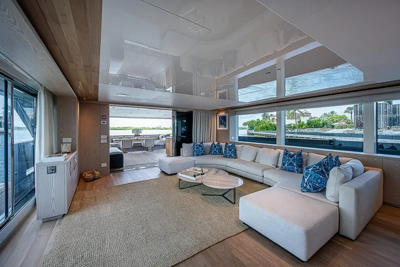 The Wolf Yacht Photos Pics Luxurious interior of 2023 Sanlorenzo SD118 yacht with spacious seating and waterfront views.