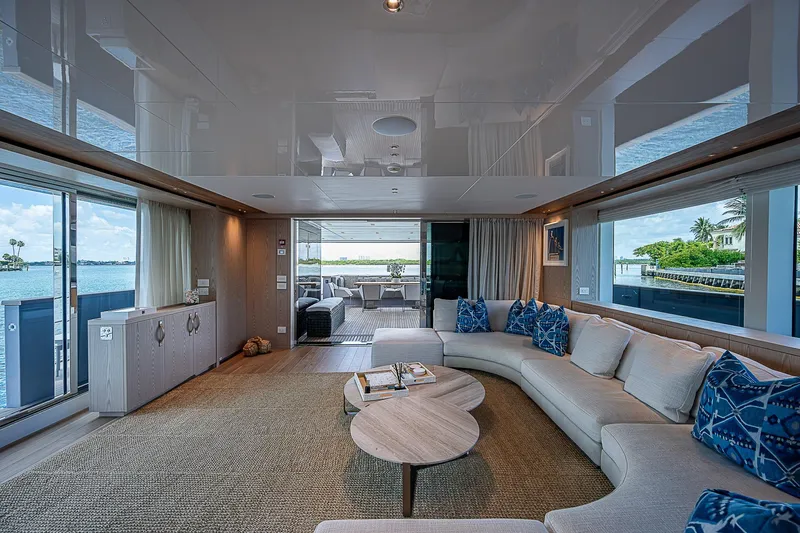 The Wolf Yacht Photos Pics Luxurious interior of 2023 Sanlorenzo SD118 yacht with panoramic windows and elegant seating.