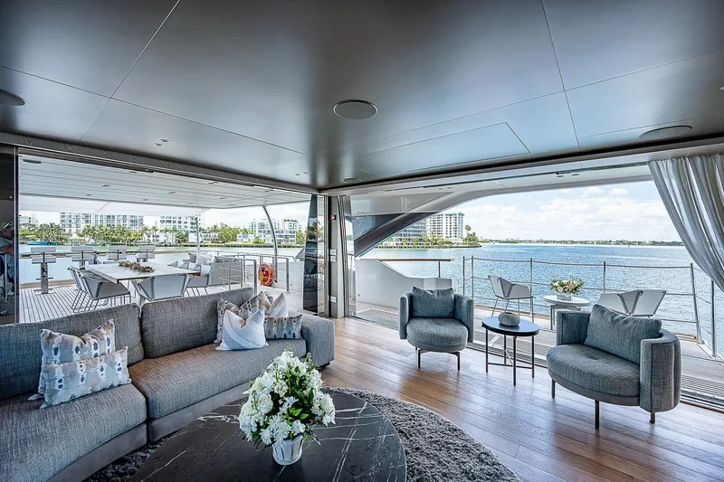 The Wolf Yacht Photos Pics Luxurious interior of 2023 Sanlorenzo SD118 yacht with ocean view and elegant seating.
