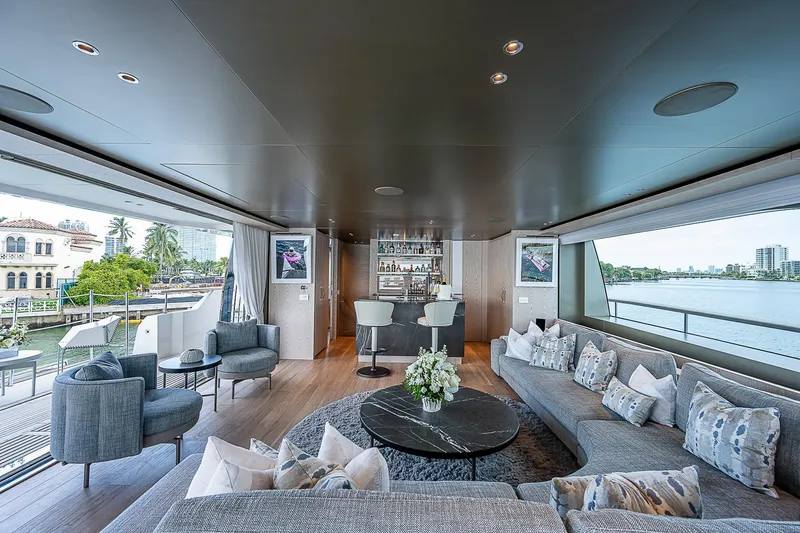 The Wolf Yacht Photos Pics Luxurious interior of 2023 Sanlorenzo SD118 yacht with elegant seating and scenic views.