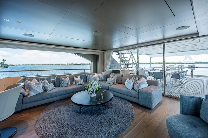 The Wolf Yacht Photos Pics Luxurious interior of 2023 Sanlorenzo SD118 yacht with elegant seating and ocean view.