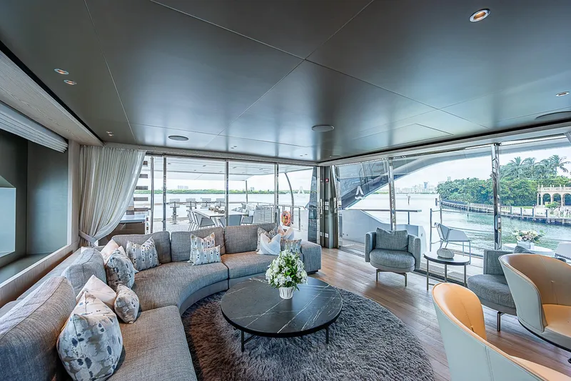 The Wolf Yacht Photos Pics Luxurious interior of 2023 Sanlorenzo SD118 yacht with elegant seating and scenic views.