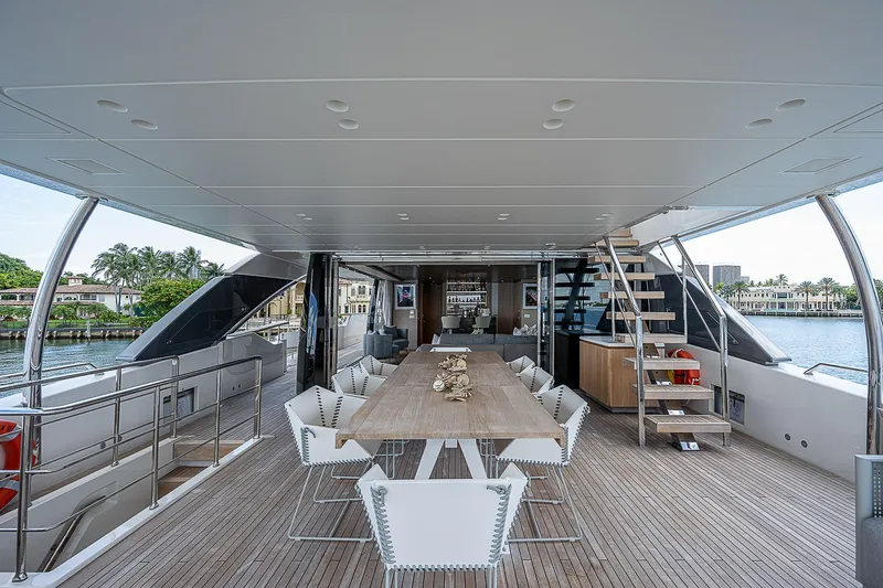The Wolf Yacht Photos Pics Luxurious 2023 Sanlorenzo SD118 yacht deck with elegant dining area and modern design.