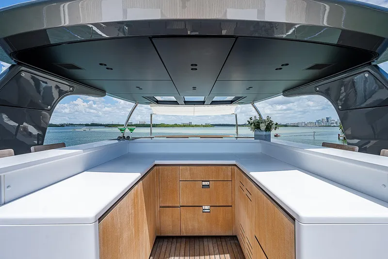 The Wolf Yacht Photos Pics Luxurious 2023 Sanlorenzo SD118 yacht deck with modern cabinetry and ocean view.