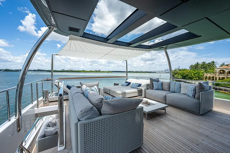 The Wolf Yacht Photos Pics Luxurious 2023 Sanlorenzo SD118 yacht deck with elegant seating and ocean view.