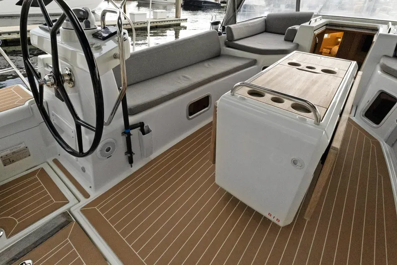 Beatrice Yacht Photos Pics Cockpit of 2021 Jeanneau Sun Odyssey 51 Performance yacht with steering wheel and seating.