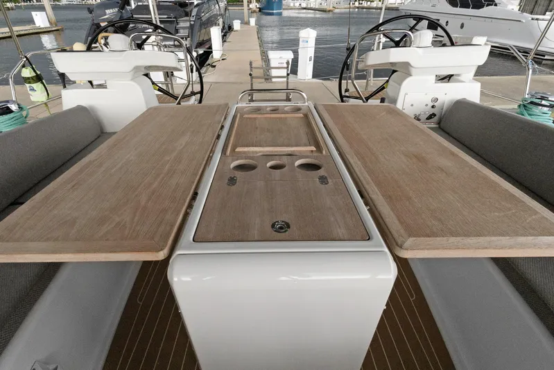 Beatrice Yacht Photos Pics Jeanneau Sun Odyssey 51 Performance yacht cockpit with wooden table, 2021 model.