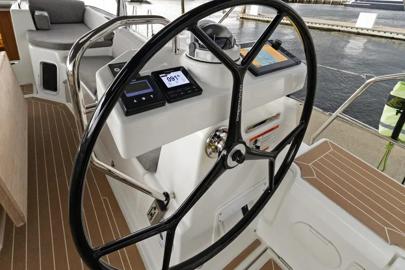 Beatrice Yacht Photos Pics Steering wheel and controls of 2021 Jeanneau Sun Odyssey 51 Performance yacht.