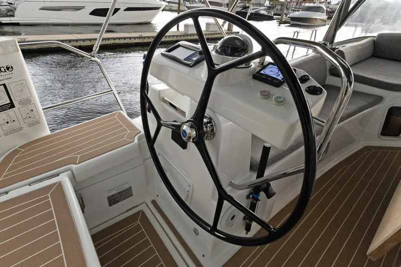 Beatrice Yacht Photos Pics Cockpit of 2021 Jeanneau Sun Odyssey 51 Performance yacht with steering wheel and controls.