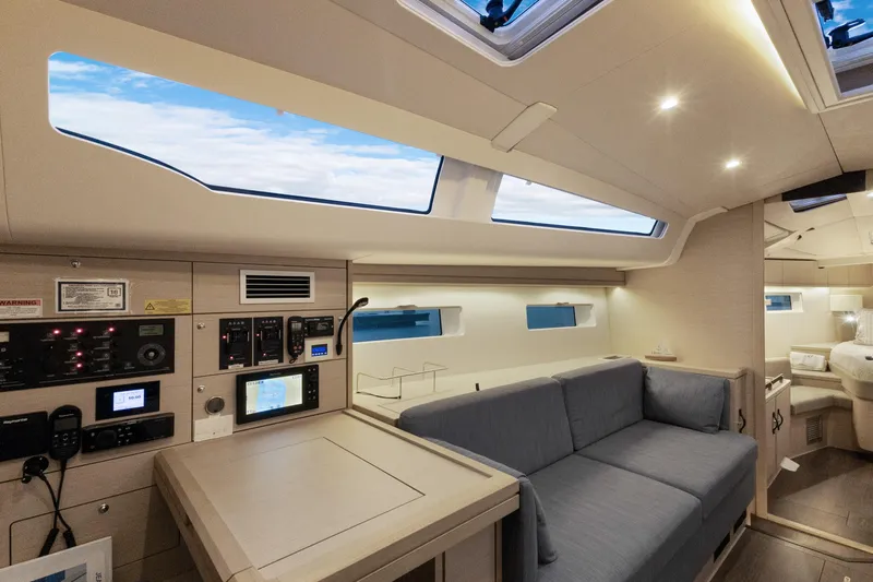Beatrice Yacht Photos Pics Luxurious interior of 2021 Jeanneau Sun Odyssey 51 Performance yacht, featuring modern design and comfortable seating.