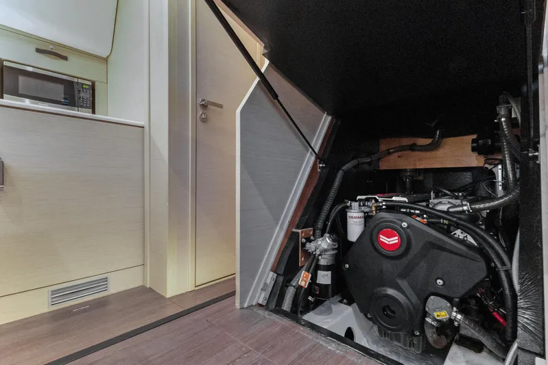 Beatrice Yacht Photos Pics Engine compartment of 2021 Jeanneau Sun Odyssey 51 Performance yacht, showcasing Yanmar engine.